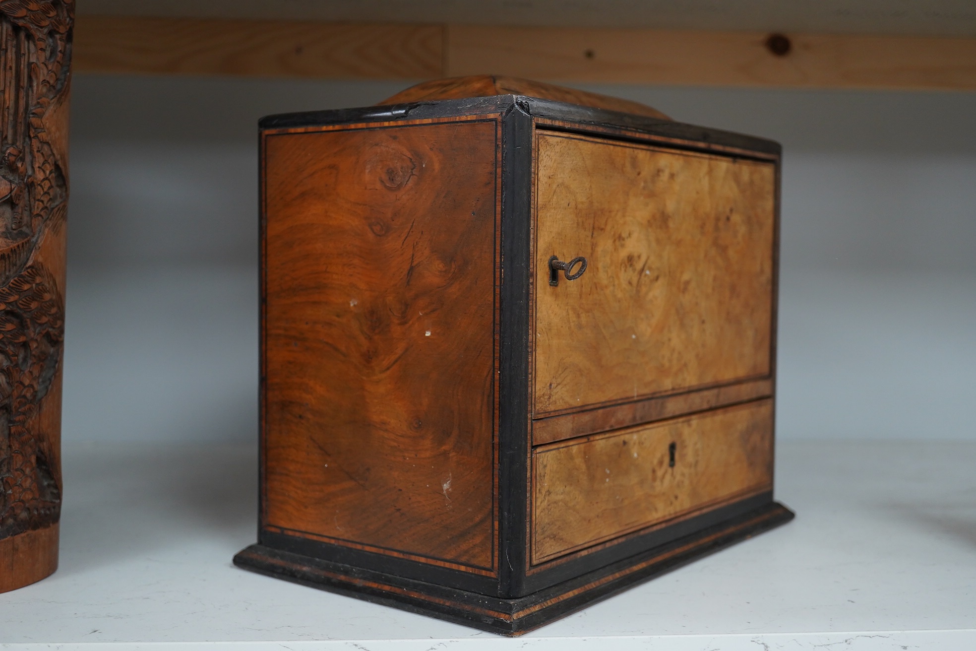 A Victorian burr walnut workbox, with blue silk semi-circular sewing drawer. 29cm wide, 26cm high. Condition - fair